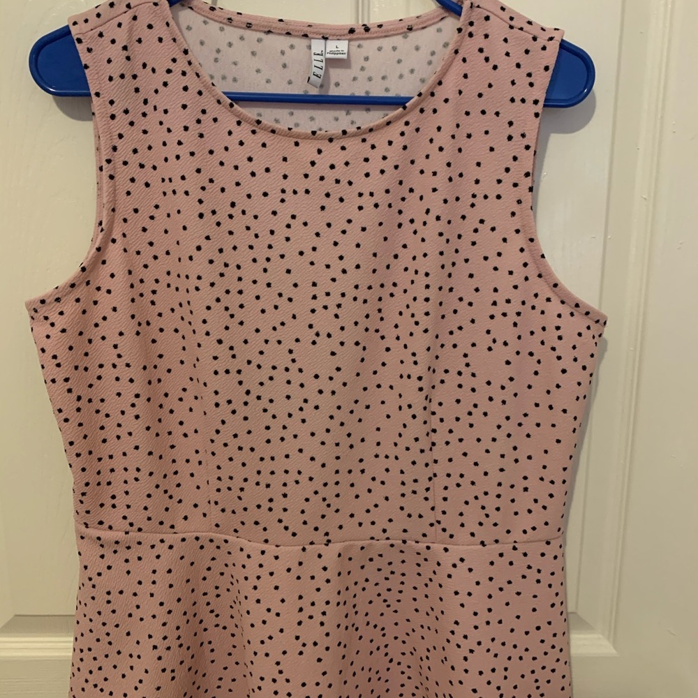 Elle Sleeveless Peplum Top